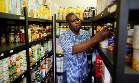 Ransford Amoah helps out at a food bank in Croydon, south London