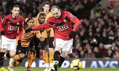 Wayne Rooney scores the penalty that gave Manchester United the lead against Wolves