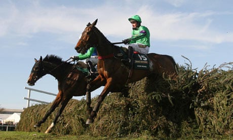 Mon Mome ridden by Liam Treadwell jumps the last to win the Grand National.