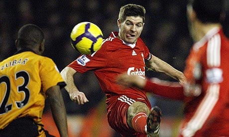 Steven Gerrard attempts to control the ball under pressure from Wolves' Ronald Zubar