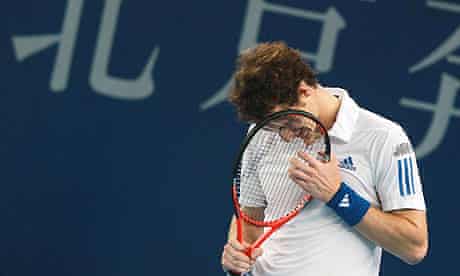 Andy Murray looks dejected during his defeat to Ivan Ljubicic at the China Open
