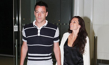 John Terry and wife Toni Poole at Heathrow Airport