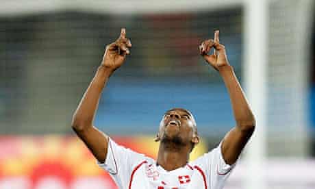 Gelson Fernandes celebrates scoring the winning goal for Switzerland against Spain