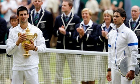Novak Djokovic holds the Wimbledon trophy