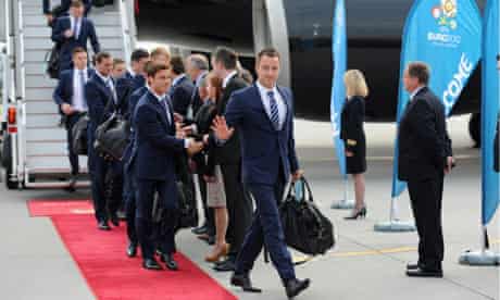 John Terry leads England's players off the plane