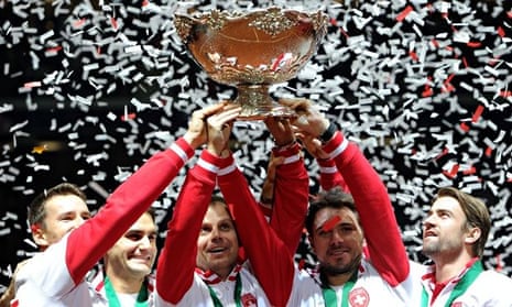 Switzerland, including Roger Federer, second from left, celebrate winning the Davis Cup