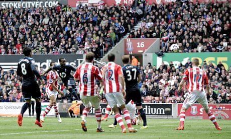 Tottenham Hotspur's Danny Rose, third left, scores against Stoke City in the Premier League