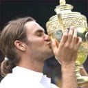 Federer kisses Wimbledon trophy