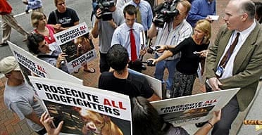 Protesters from People for the Ethical Treatment of Animals (Peta), talk to reporters about Michael Vick outside court
