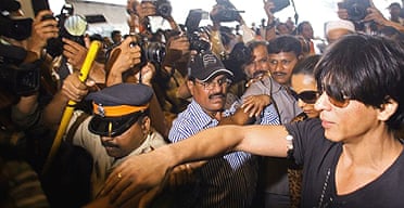 Kolkata team owner Shahrukh Khan arrives at the auction in Mumbai