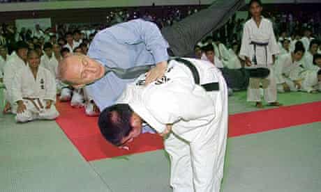 Vladimir Putin is thrown by a Japanese Judo student 