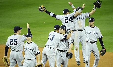 New York Yankees players celebrate winning game four of the World Series