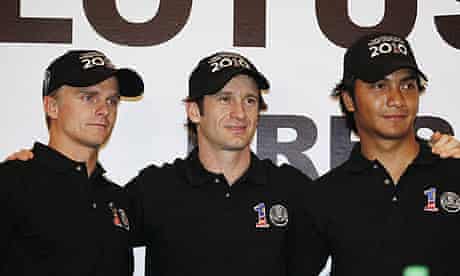 Heikki Kovalainen (left), Jarno Trulli (centre) and Fairuz Fauzy - Lotus F1
