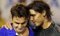 Rafael Nadal hugs his defeated opponent Roger Federer