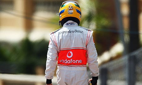 Lewis Hamilton walks back to the pits