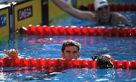 Michael Phelps glares at the times for the 200m freestyle final