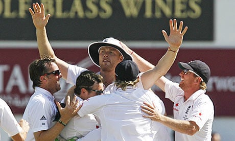 Andrew Flintoff is swamped by his England team-mates after running out Ricky Ponting at The Oval