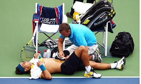 Rafael Nadal treated for stomach injury during US Open third-round victory | US Open tennis | The Guardian