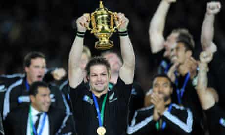 The New Zealand captain, Richie McCaw, holds aloft the Webb Ellis Cup