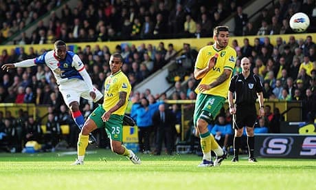 Junior Hoilett of Blackburn Rovers scores the first goal against Norwich City at Carrow Road.