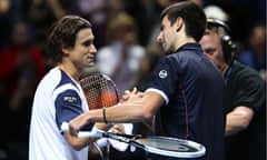 David Ferrer, left, is congratulated by Novak Djokovic after his 6-3, 6-1 victory at the O2 Arena