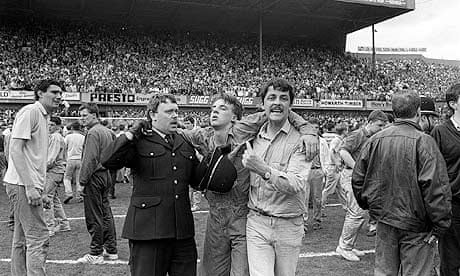 An injured fan receives attention during the Hillsborough disaster of 1989