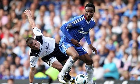 Mikel John Obi holds off Rafael van der Vaart during Chelsea's win against Tottenham