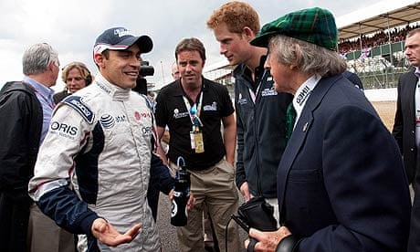 Rubens Barrichello talks to Williams team-mate Pastor Maldonado