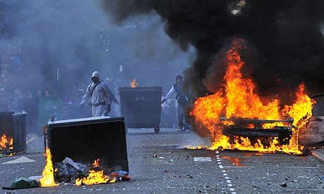 A car burns in Hackney during the rioting which engulfed London last week
