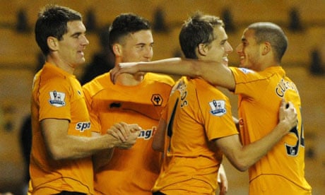 David Edwards celebrates with team-mates after scoring Wolves' first goal against Millwall