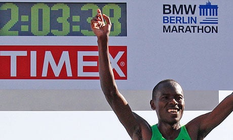 Patrick Makau crosses the finish line to win the 38th Berlin Marathon