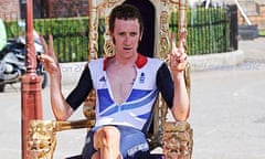 Bradley Wiggins relaxes in his gold throne after winning the Olympic time trial