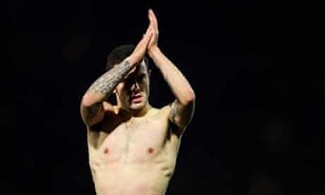 Jack Wilshere salutes the Arsenal supporters after their team's Capital One Cup defeat at Bradford