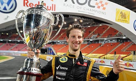 Romain Grosjean celebrates with the Race of Champions trophy