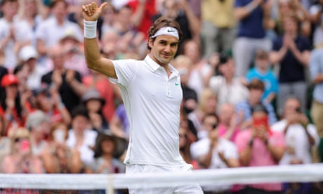 Roger Federer celebrates after defeating Fabio Fognini