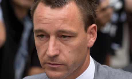 John Terry leaves court after being found not guilty of racially abusing Anton Ferdinand