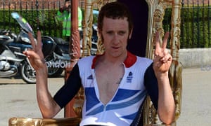 Bradley Wiggins sits on a throne after his victory in the time trial