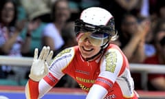 Becky James celebrates winning the women's sprint at the national track championships