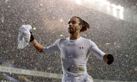 Tottenham's Benoît Assou-Ekotto throws his shirt into the crowd