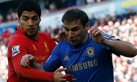 Luis Suárez, left, and Branislav Ivanovic tussel during Liverpool's 2-2 draw with Chelsea at Anfield