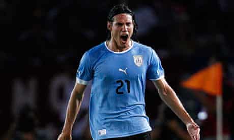 Edinson Cavani celebrates scoring for Uruguay against Venezuela