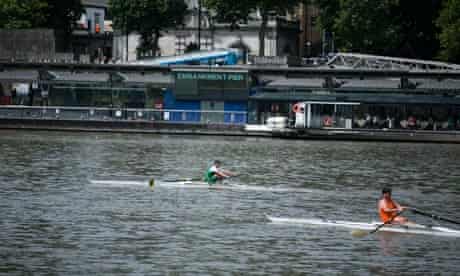 Rowers race on the Thames as they strive to win the 299th running of Doggett's Coat and Badge.