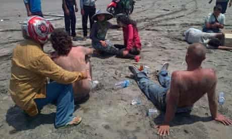 Residents help survivors in Java