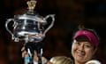 Li Na holds the Australian Open trophy after defeating Dominika Cibulkova