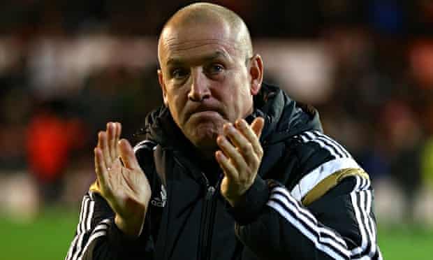 Brentford manager Mark Warburton took a huge risk swapping his city job for football.