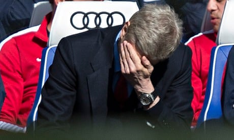 Arsène Wenger can't bear to watch during Arsenal's 6-0 defeat by Chelsea at Stamford Bridge.