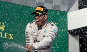 Lewis Hamilton celebrates after starting the way he meant to go on by winning the Australian GP.