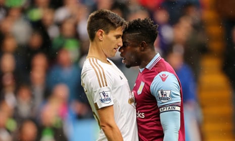 Micah Richards, right, and Federico Fernández square up during Aston Villa's 2-1 defeat to Swansea 