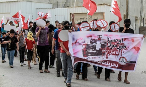 Protestors march against the presence of Formula One in Bahrain before the Bahrain Grand Prix.