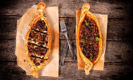 Classic Turkish pide with meat and sauce